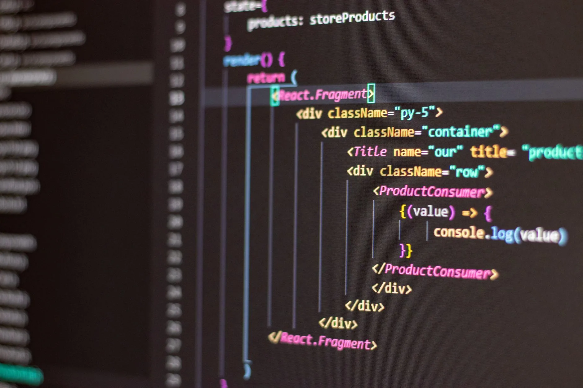 Close up of HTML and JavaScript code on a computer screen in Visual Studio Code.